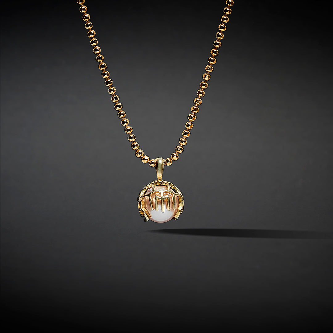 The Gilded Pearl Pendant